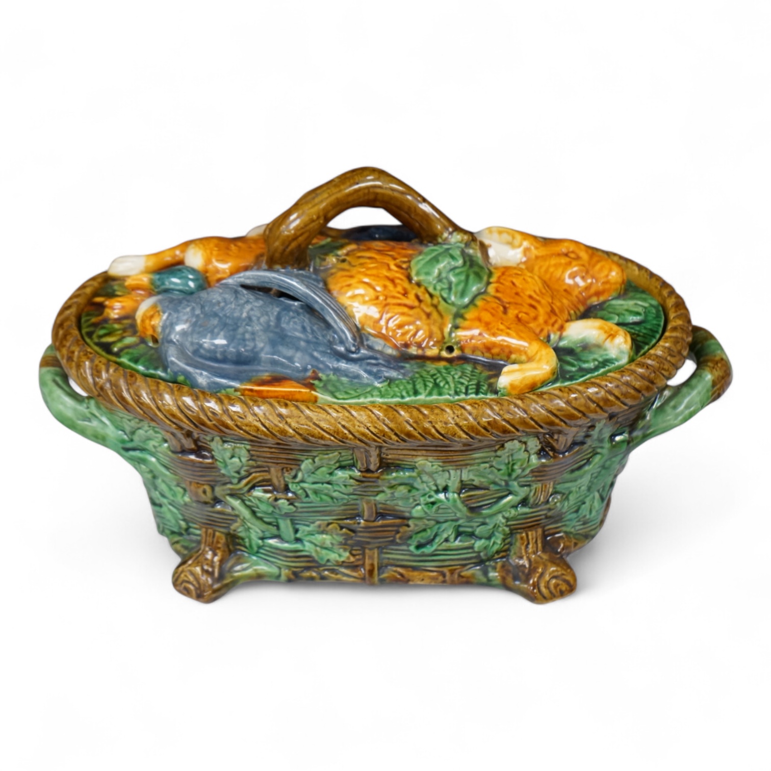 A majolica style game pie dish, 37cm wide